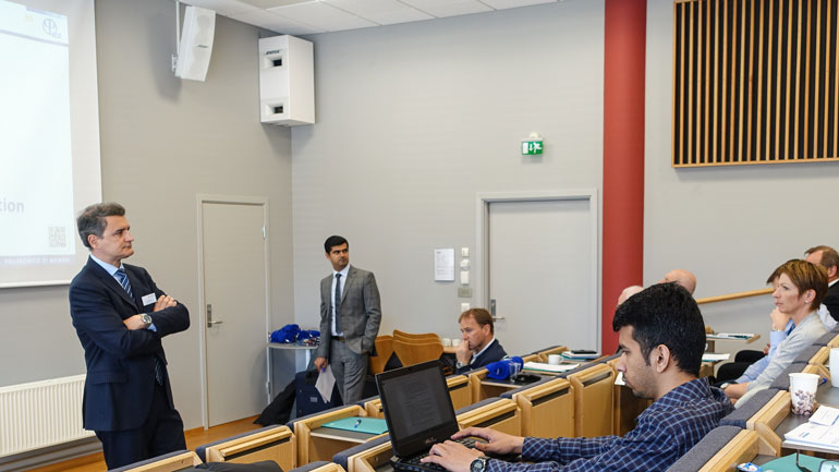 From left: Professor Davide Manca, head of Process Systems Engineering Laboratory at Politecnico di Milano and Salman Nazir at HSN in front of academics and professionals from the maritime industry.  Photo