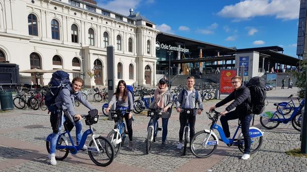 International students on bikes in Oslo