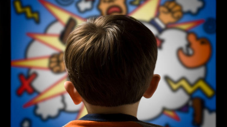 Illustrasjonsbilde med bakhode til et barn som ser en tegneserievegg med vold