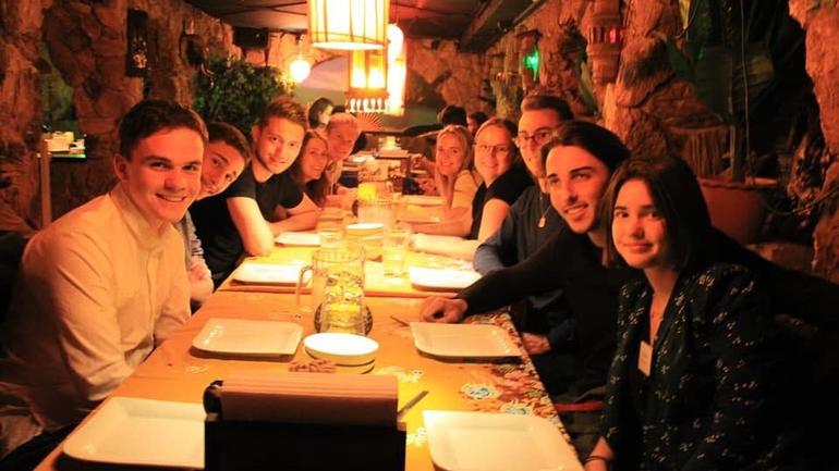 Florian having dinner with friends