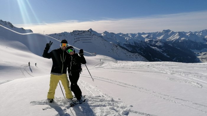 Ryan skiing with a friend