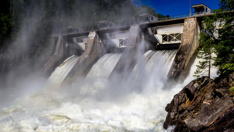  Hydropower dams with waterfall.