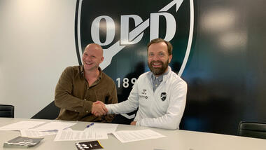 ODDs daglige leder, Einar Håndlykken og programkoordinator ved USN, Jo Grønlund, signerer partnerskapsavtalen. Foto