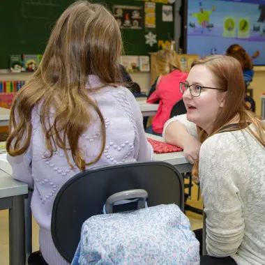 Student med elev i praksis.