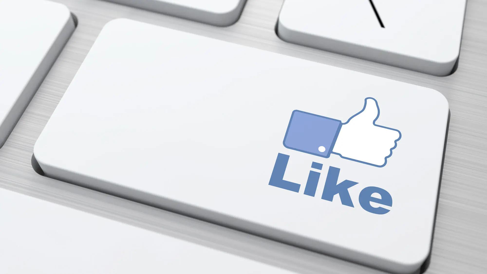 Bilde av en Facebook-like-knapp på laptop